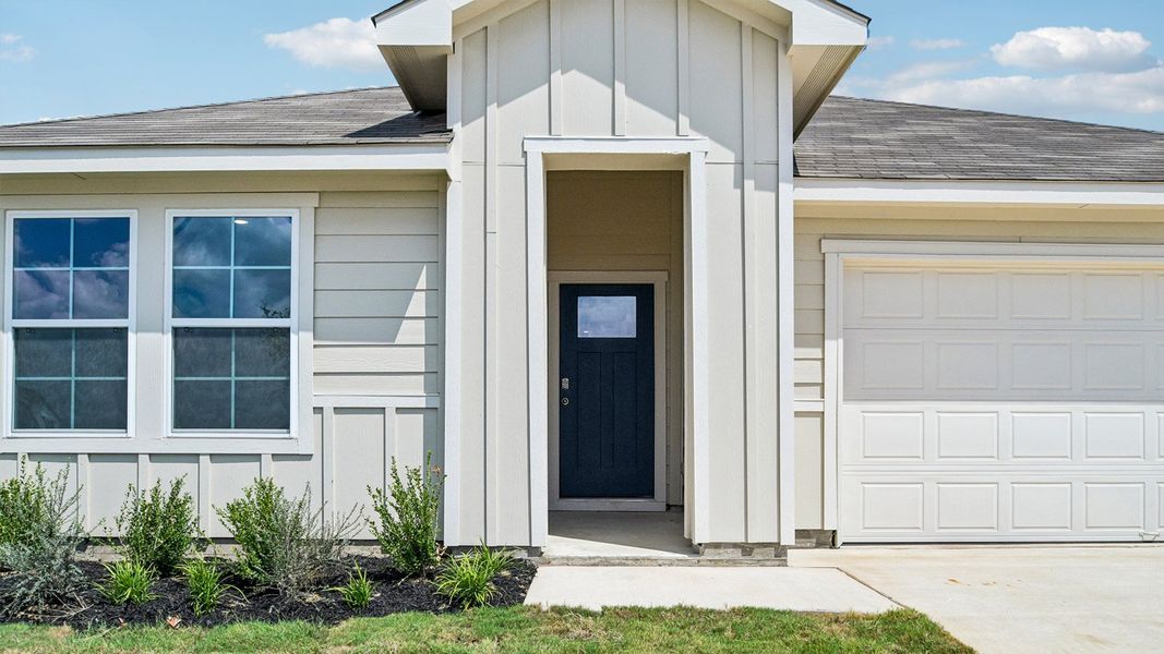 Exterior details and patio area of a home in Prairie Lakes, Buda (Image 3).