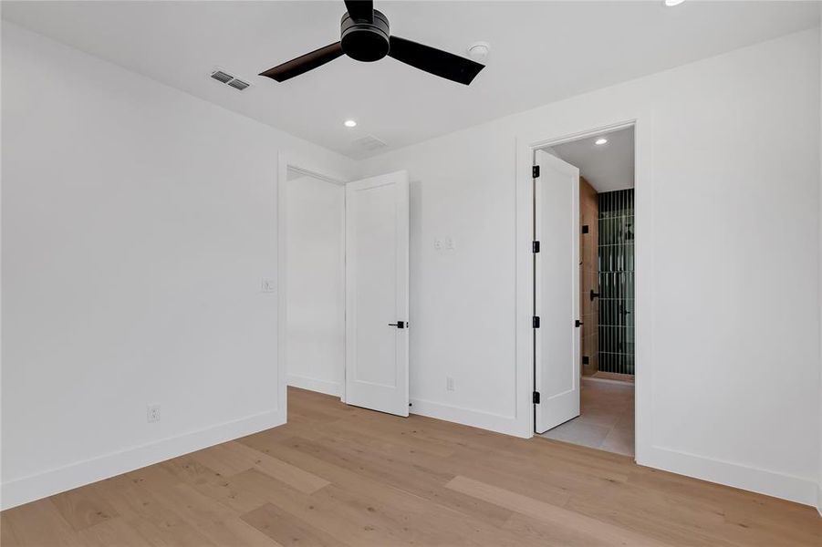 Unfurnished bedroom with light wood-style floors, recessed lighting, and ceiling fan Unfurnished bedroom with light wood-style floors, recessed lighting, and ceiling fan