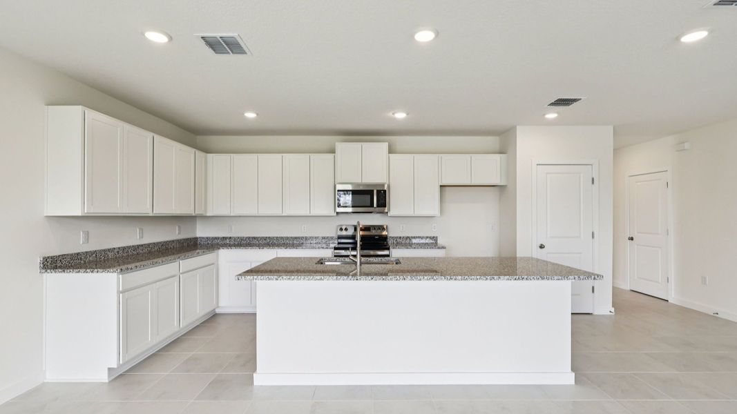 Representative furnished interior of a home built from the Baker by DRB Homes in Hamilton Bluff, Haines City (Image 12).