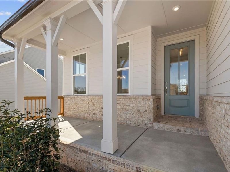 Exterior details and patio area of a home in Wehunt Meadows, Hoschton (Image 3).