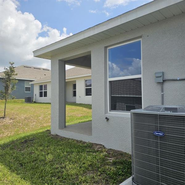 Exterior details and patio area of a home in Magnolia Park, Haines City (Image 20).