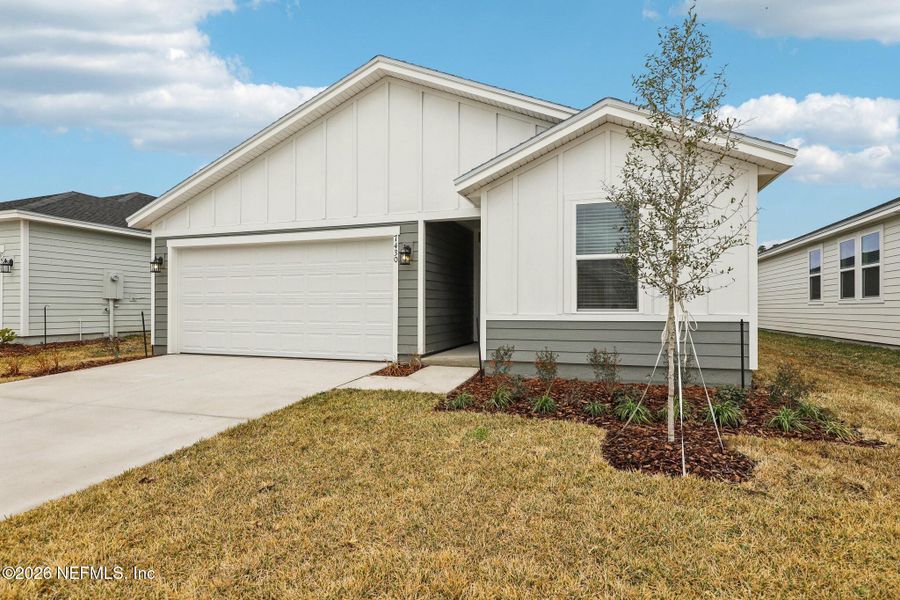 Front exterior of a new home in , Jacksonville, FL, highlighting curb appeal (Image 22).