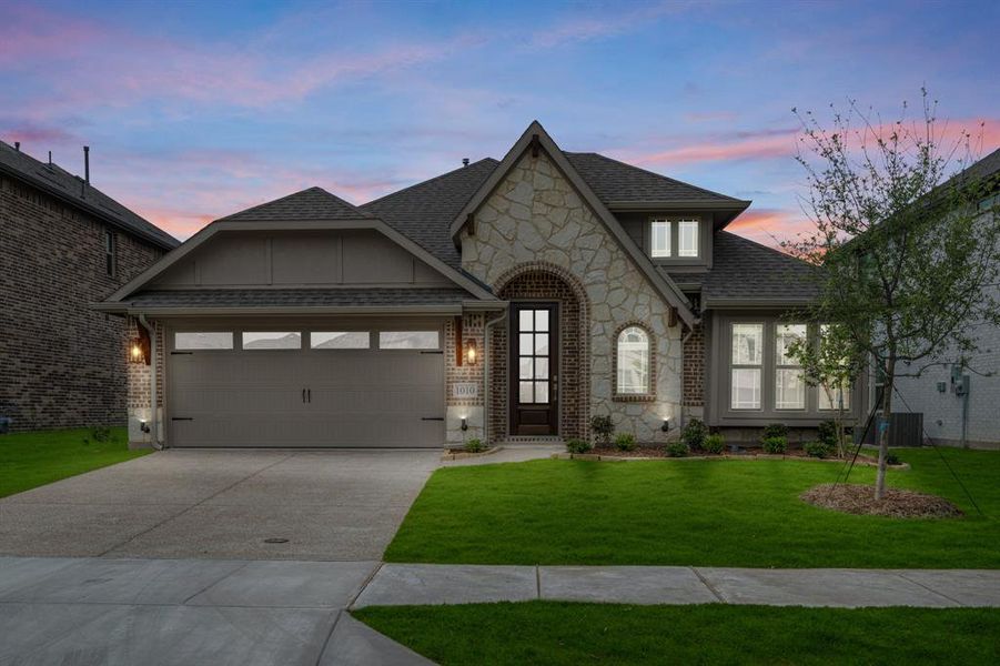 Front exterior of a new home in Legacy Ranch Classic 55, Melissa, TX, highlighting curb appeal (Image 22). Front exterior of a new home in Legacy Ranch Classic 55, Melissa, TX, highlighting curb appeal (Image 22).