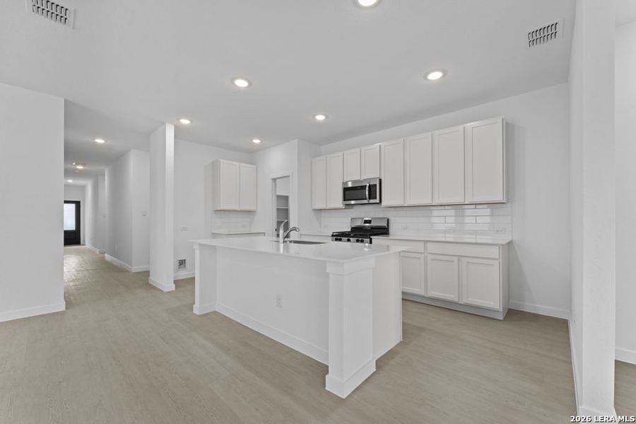 Furnished interior view inside a new home in Sky Ranch, New Braunfels (Image 5).