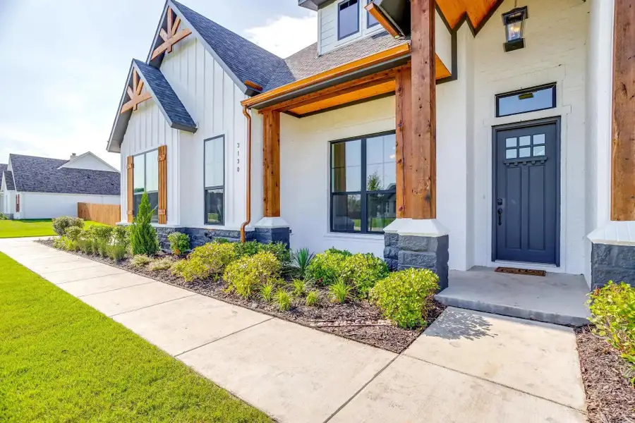 Representative exterior photo of a completed home built from the The Kellyn by Elmwood Custom Homes in Byrum Ranch, Maypearl, TX (Image 6). Representative exterior photo of a completed home built from the The Kellyn by Elmwood Custom Homes in Byrum Ranch, Maypearl, TX (Image 6).