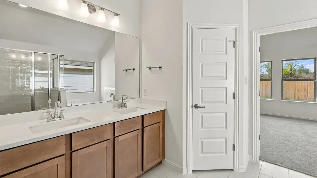 Furnished interior view inside a new home in Carillon, Manor (Image 10).