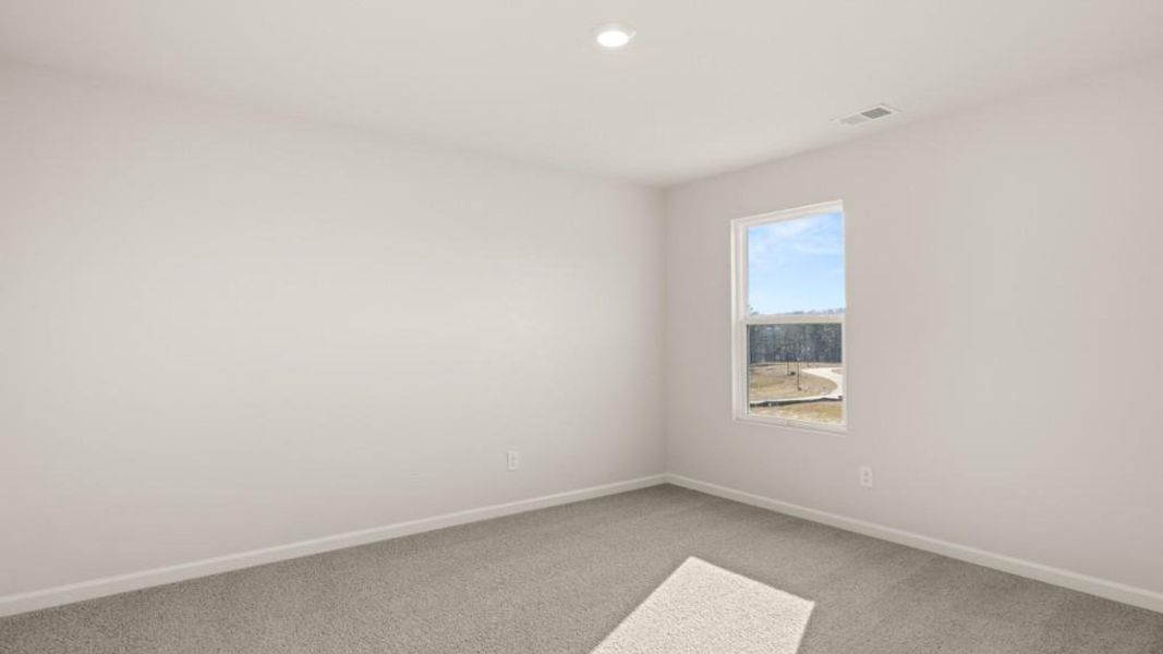 Spacious, unfurnished interior of a new home in Fairway 17 at Mirror Lake, Villa Rica (Image 29).