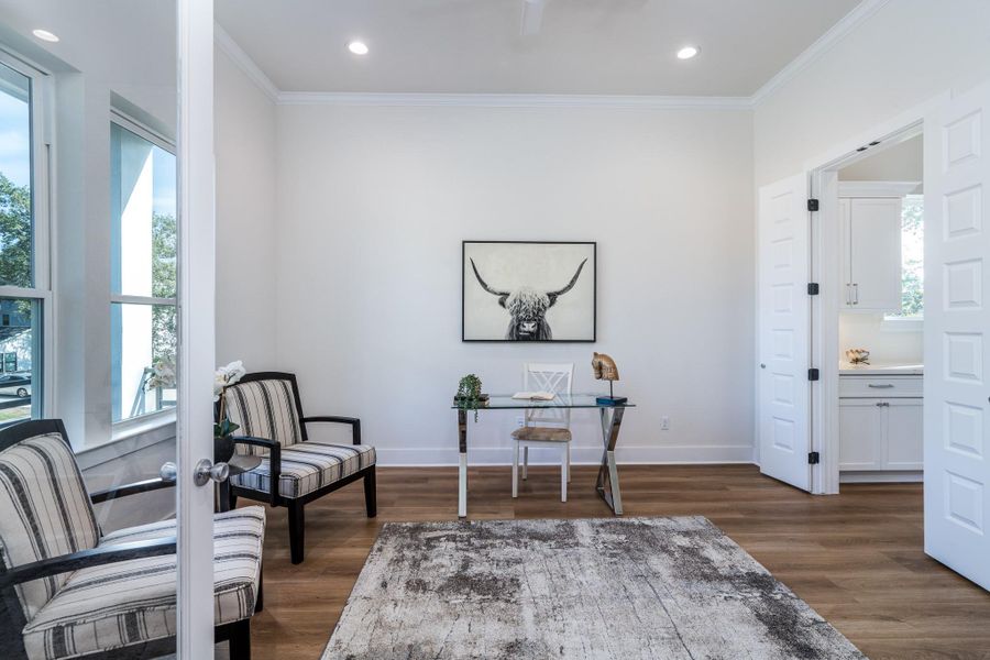 Private home office with double doors and refined finishes, offering a peaceful setting for work or study. This room can also be used as formal dining if preferred. Private home office with double doors and refined finishes, offering a peaceful setting for work or study. This room can also be used as formal dining if preferred.