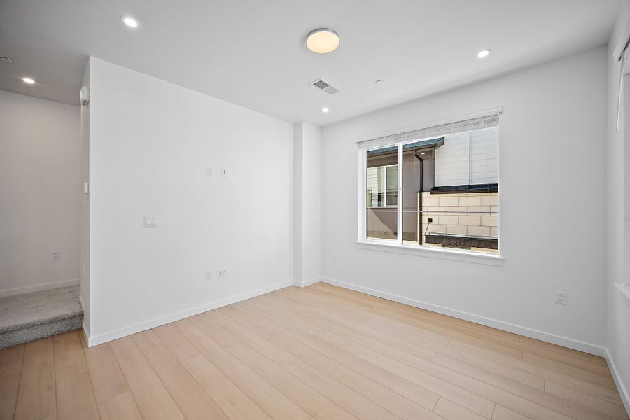 Spacious, unfurnished interior of a new home in Lyric at RidgeGate Townhomes, Lone Tree (Image 17).