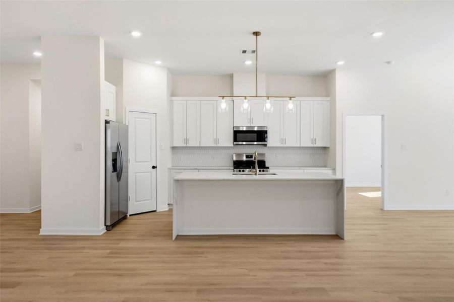 The refrigerator is included in this sale, along with the washer and dryer.