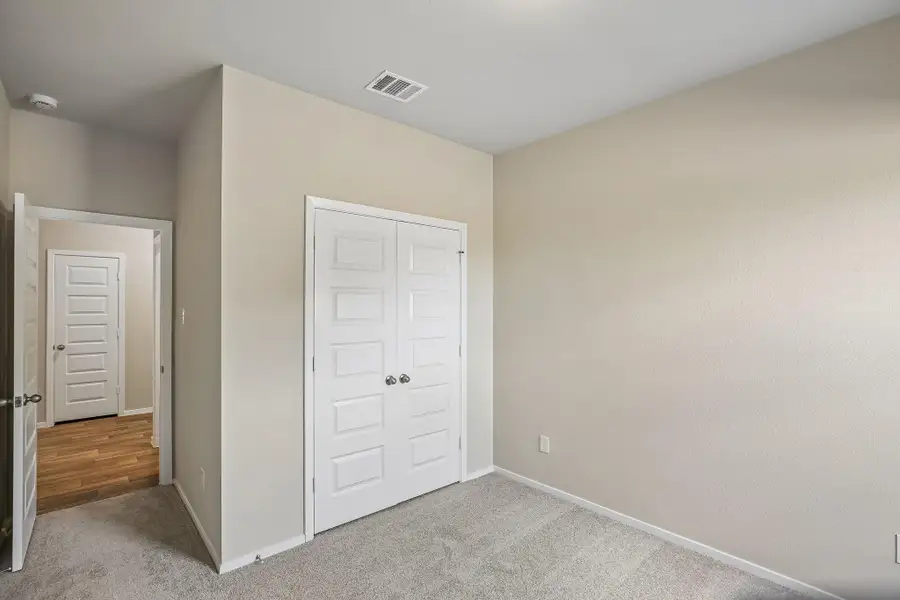 Designed with flexibility in mind, these generously-sized secondary bedrooms provide both comfort and functionality to fit your lifestyle.