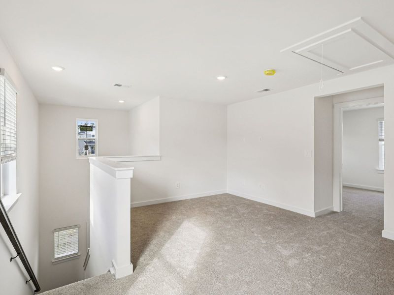 The upstairs loft gives the kids a place to study.