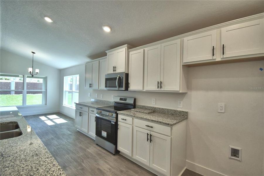 Furnished interior view inside a new home in Lake Juliana Estates, Auburndale (Image 13).