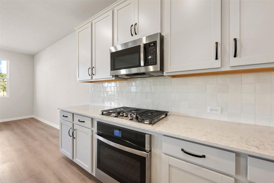 Furnished interior view inside a new home in The Colony 50s, Bastrop (Image 7). Furnished interior view inside a new home in The Colony 50s, Bastrop (Image 7).