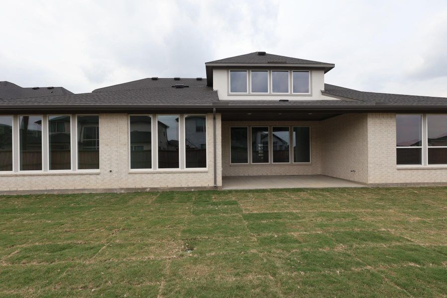 Exterior details and patio area of a home in Dunham Pointe, Cypress (Image 3).