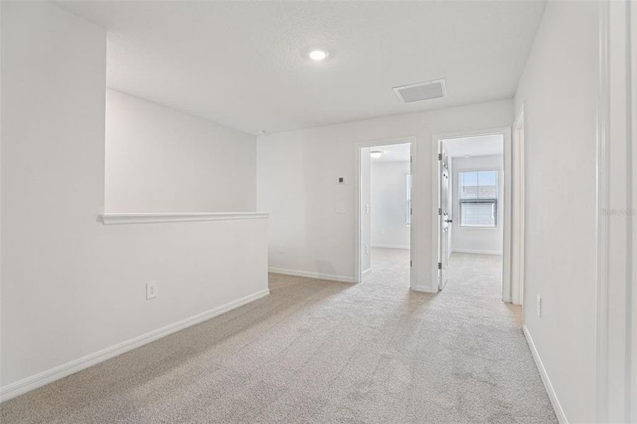 Spacious, unfurnished interior of a new home in Cagan Crossings West, Clermont (Image 25).