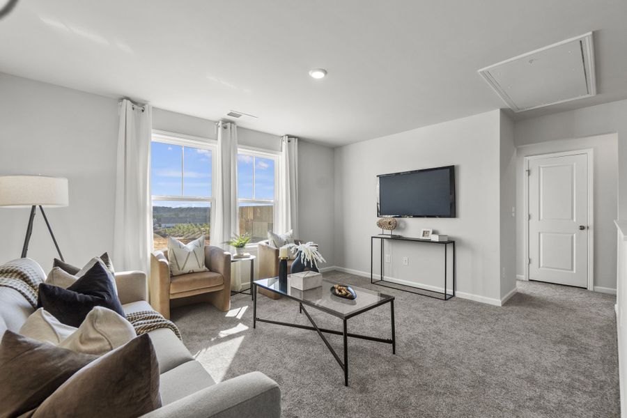 Representative furnished interior of a home built from the Manteo Premier by Taylor Morrison in The Coves on Lake Wylie, Charlotte (Image 27).