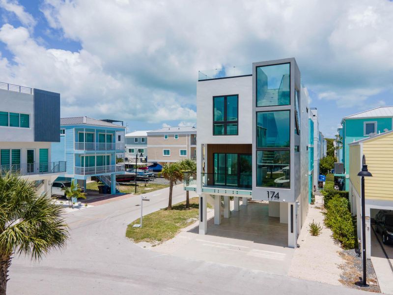 Front exterior of a new home in , Key Largo, FL, highlighting curb appeal (Image 29).