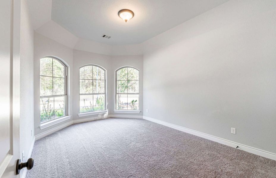 Representative unfurnished interior of a home built from the 3358 by Ravenna Homes in Artavia 70′, Conroe (Image 52).