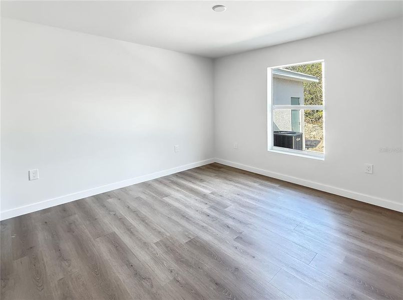 Spacious, unfurnished interior of a new home in , Port Charlotte (Image 23).
