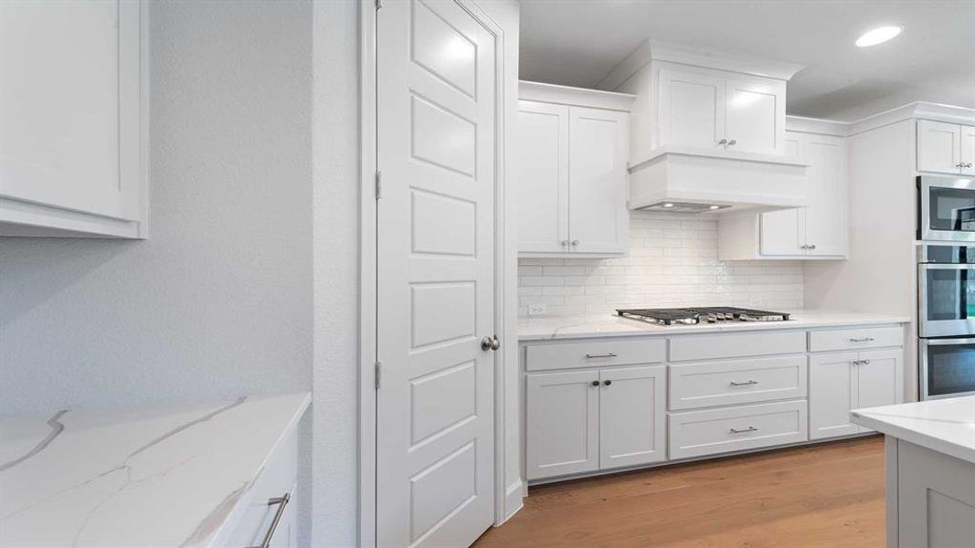 Furnished interior view inside a new home in The Heights At Uptown Celina 50', Celina (Image 11).