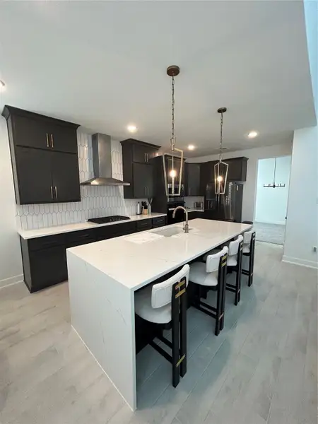 Gorgeous waterfall countertop centerpiece in the kitchen Gorgeous waterfall countertop centerpiece in the kitchen