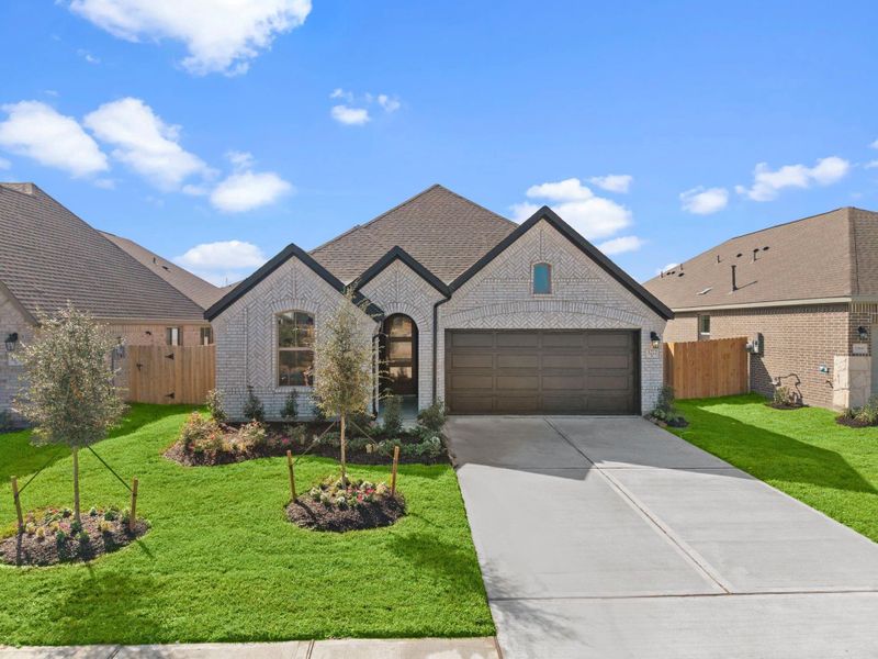 Front exterior of a new home in , Spring, TX, highlighting curb appeal (Image 15). Front exterior of a new home in , Spring, TX, highlighting curb appeal (Image 15).