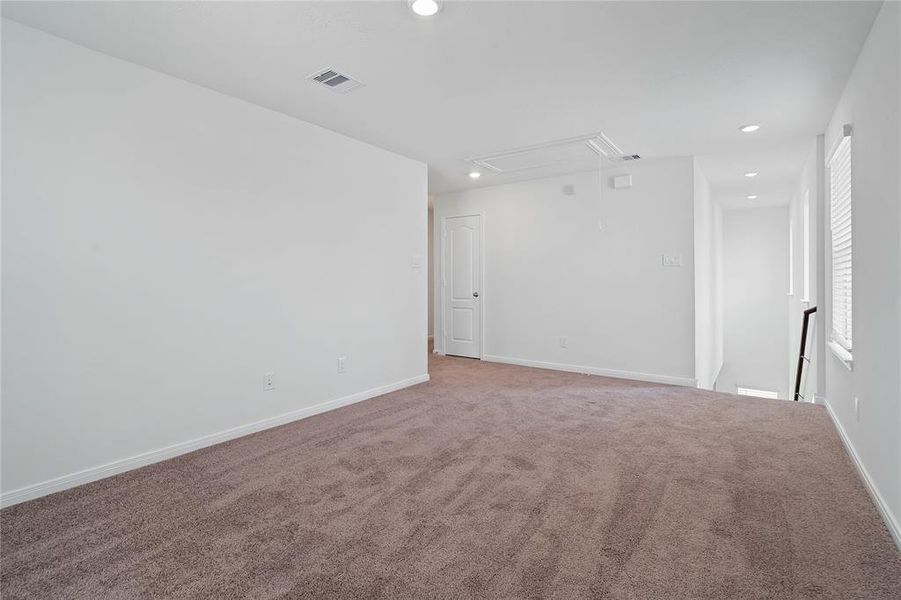 Another view from the Game Room looking towards staircase and bedrooms hallway.