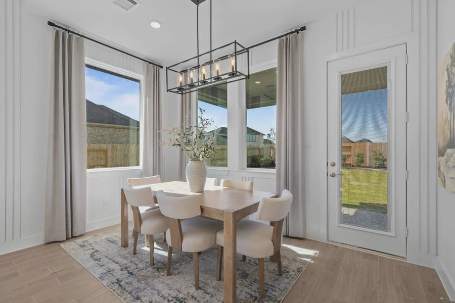Representative furnished interior of a home built from the PT Bonneville by Chesmar Homes in Attwater, Waller (Image 7).