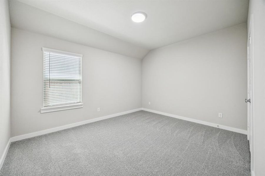 Bedroom in the Oscar home plan by Trophy Signature Homes – REPRESENTATIVE PHOTO Bedroom in the Oscar home plan by Trophy Signature Homes – REPRESENTATIVE PHOTO