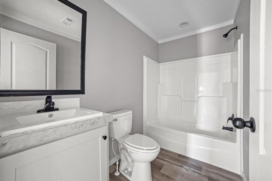 Furnished interior view inside a new home in , Okeechobee (Image 9).