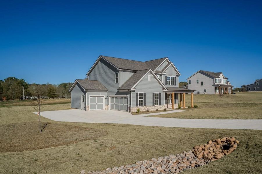Front exterior of a new home in , Good Hope, GA, highlighting curb appeal (Image 20).