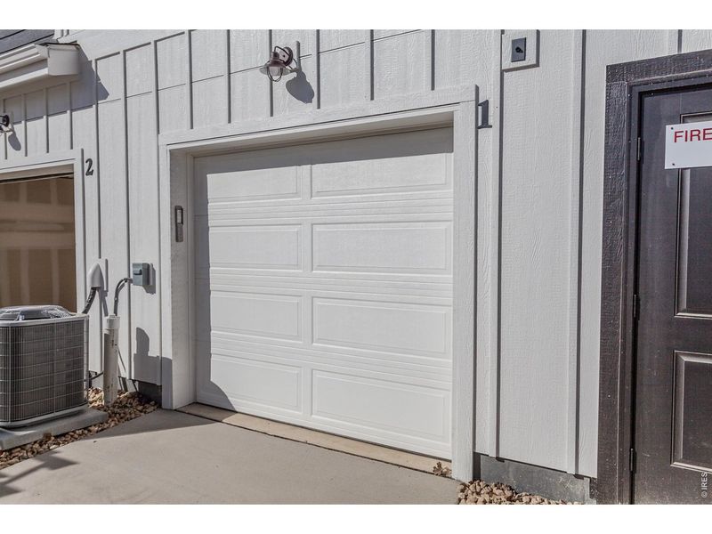 Exterior details and patio area of a home in Raindance Condos, Windsor (Image 21).