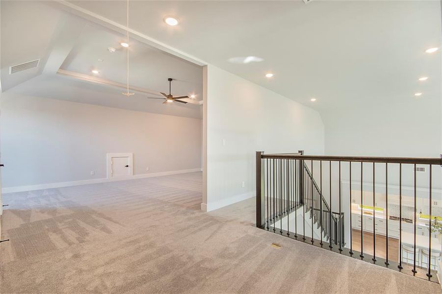 Spare room featuring light carpet, recessed lighting, and ceiling fan Spare room featuring light carpet, recessed lighting, and ceiling fan