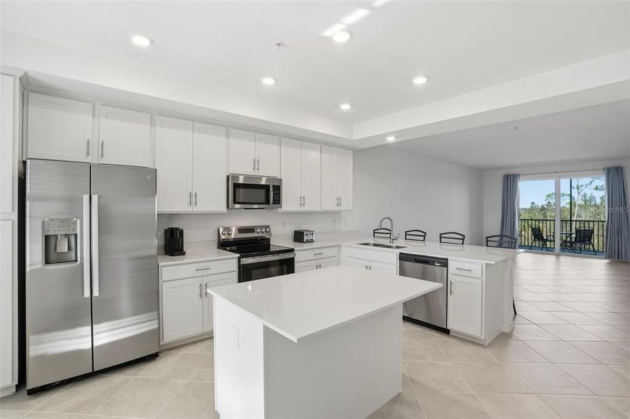 Furnished interior view inside a new home in Heritage Landing, Punta Gorda (Image 10).