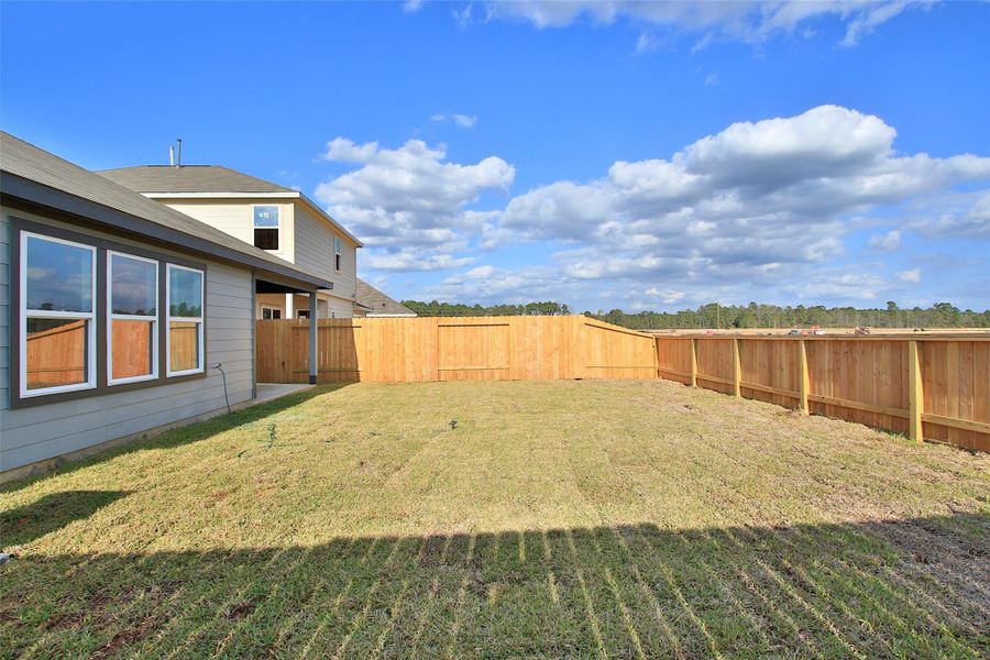 Exterior details and patio area of a home in Cielo, Conroe (Image 2). Exterior details and patio area of a home in Cielo, Conroe (Image 2).
