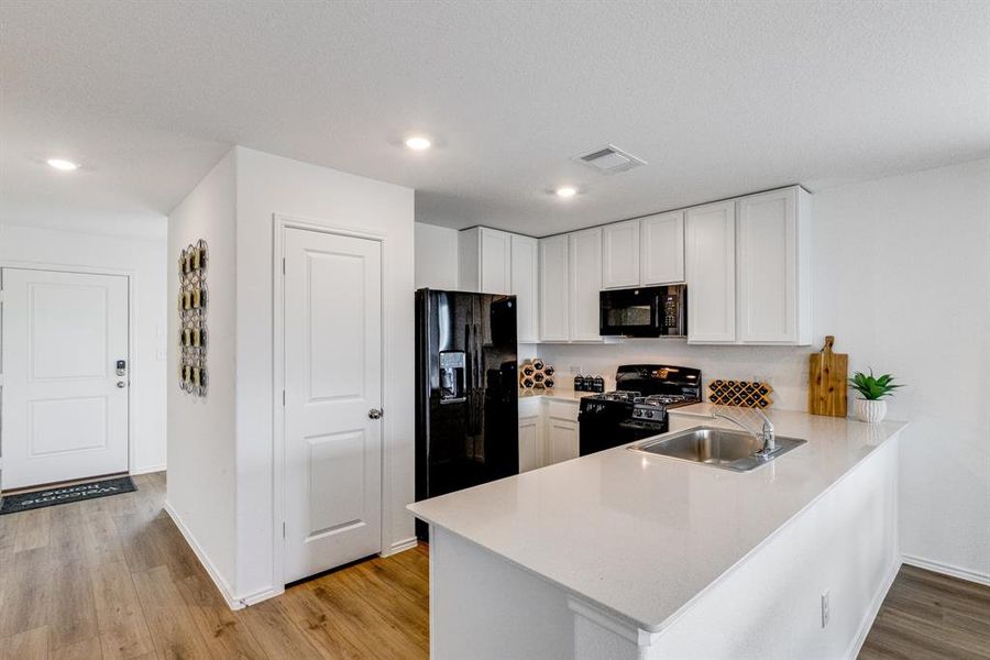 Furnished interior view inside a new home in Northpointe: Watermill Collection, Fort Worth (Image 10). Furnished interior view inside a new home in Northpointe: Watermill Collection, Fort Worth (Image 10).