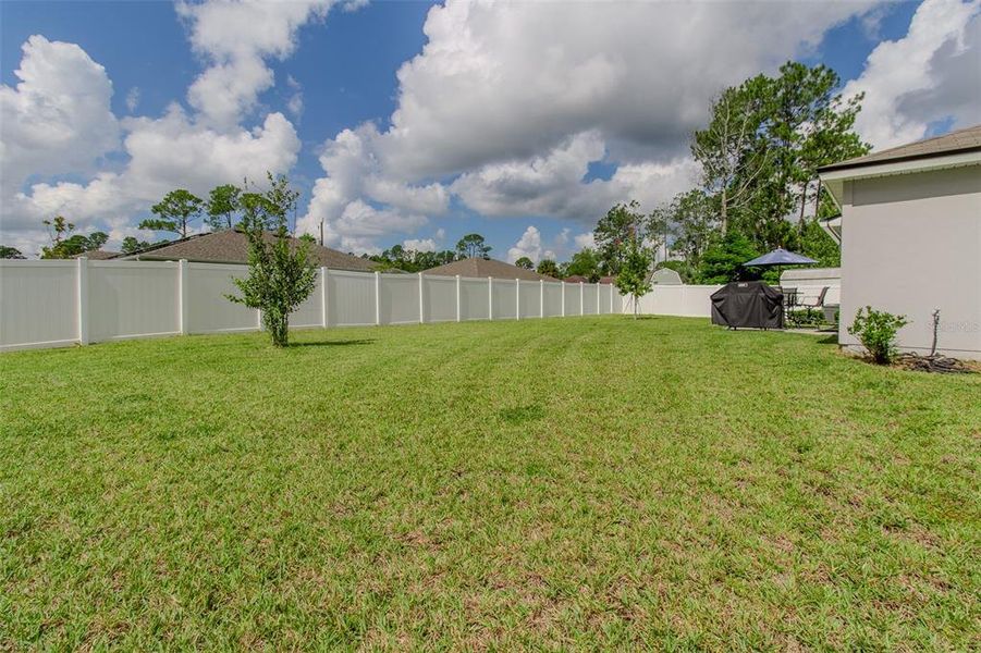 Front exterior of a new home in Palm Coast Homesites, Palm Coast, FL, highlighting curb appeal (Image 21).
