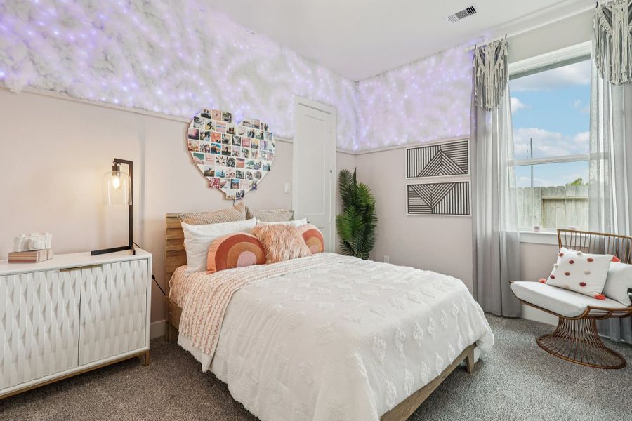 Representative furnished interior of a home built from the Orlando by Chesmar Homes in The Woodlands Hills, Willis (Image 13).