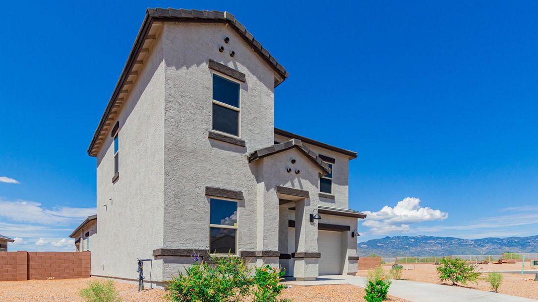 Representative exterior photo of a completed home built from the River by D.R. Horton in The Oasis at Rocking K, Vail, AZ (Image 17).