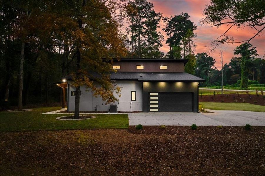 Front exterior of a new home in , Winder, GA, highlighting curb appeal (Image 26). Front exterior of a new home in , Winder, GA, highlighting curb appeal (Image 26).