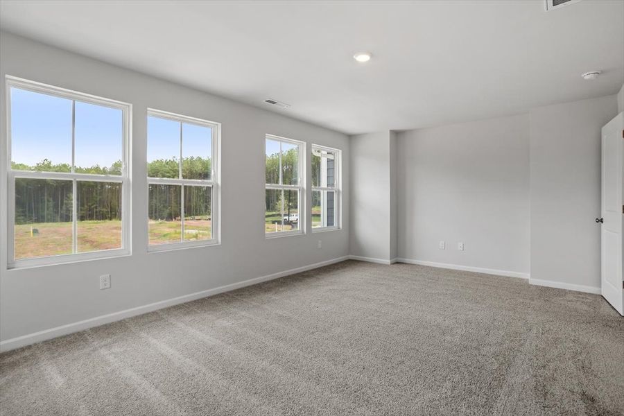 Spacious, unfurnished interior of a new home in Sweetbrier, Durham (Image 22).