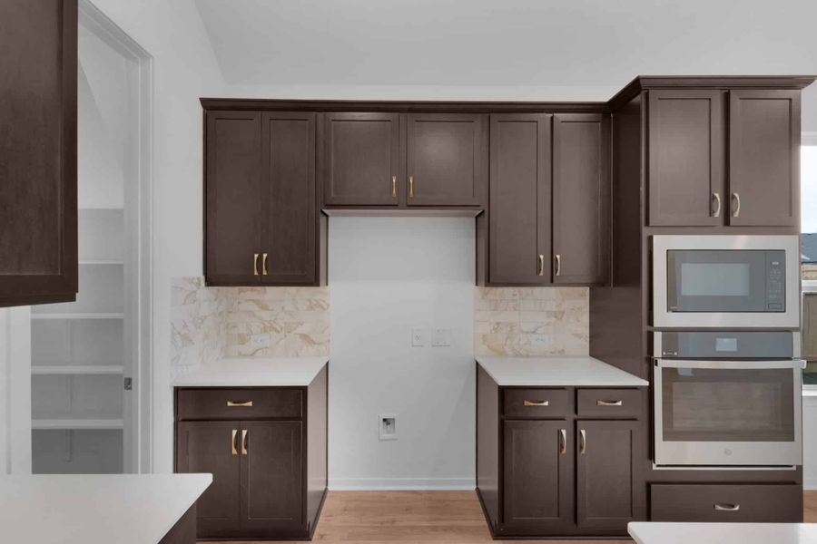 Furnished interior view inside a new home in Carillon, Manor (Image 9).