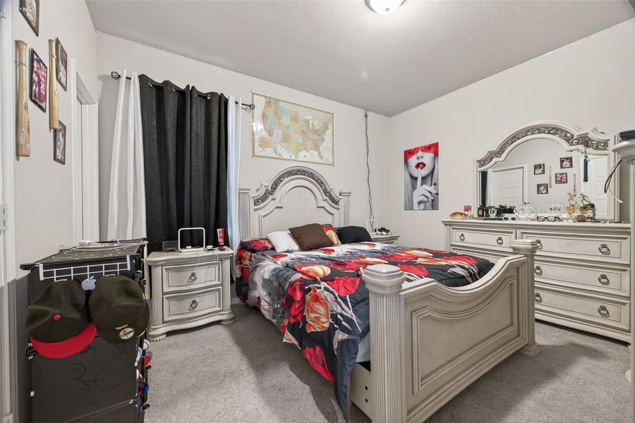 Furnished interior view inside a new home in Sunterra, Katy (Image 28).