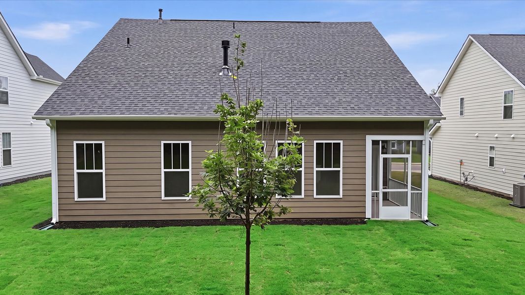 Exclusive rear screened-in porch with accomplished detail and elevated outdoor living potential at Creeks at Midway