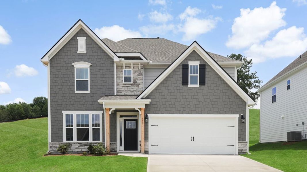 Front exterior of a new home in Sunset Summits, Spartanburg, SC, highlighting curb appeal (Image 1). Front exterior of a new home in Sunset Summits, Spartanburg, SC, highlighting curb appeal (Image 1).