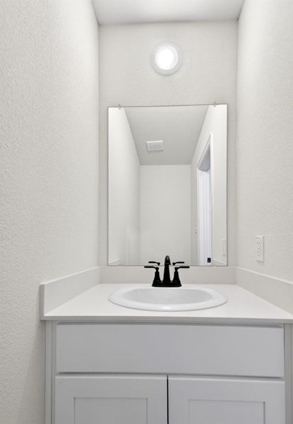 Half bath in the hallway on main floor