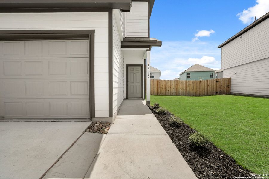 Exterior details and patio area of a home in Melissa Ranch, San Antonio (Image 4). Exterior details and patio area of a home in Melissa Ranch, San Antonio (Image 4).