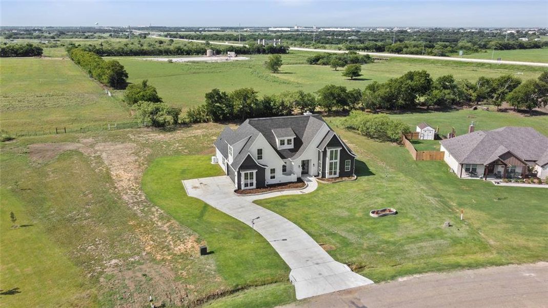 Front exterior of a new home in , Joshua, TX, highlighting curb appeal (Image 24).