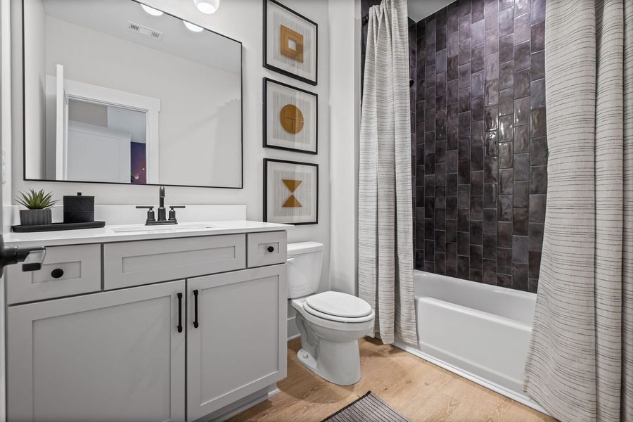 Representative furnished interior of a home built from the The Kennedy by JW Collection in Devin's Shire, Kennesaw (Image 33).